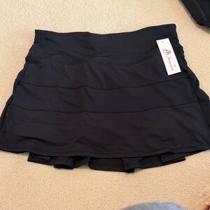 Amazon Black Tiered Athletic Skort with Hidden Zip Pocket